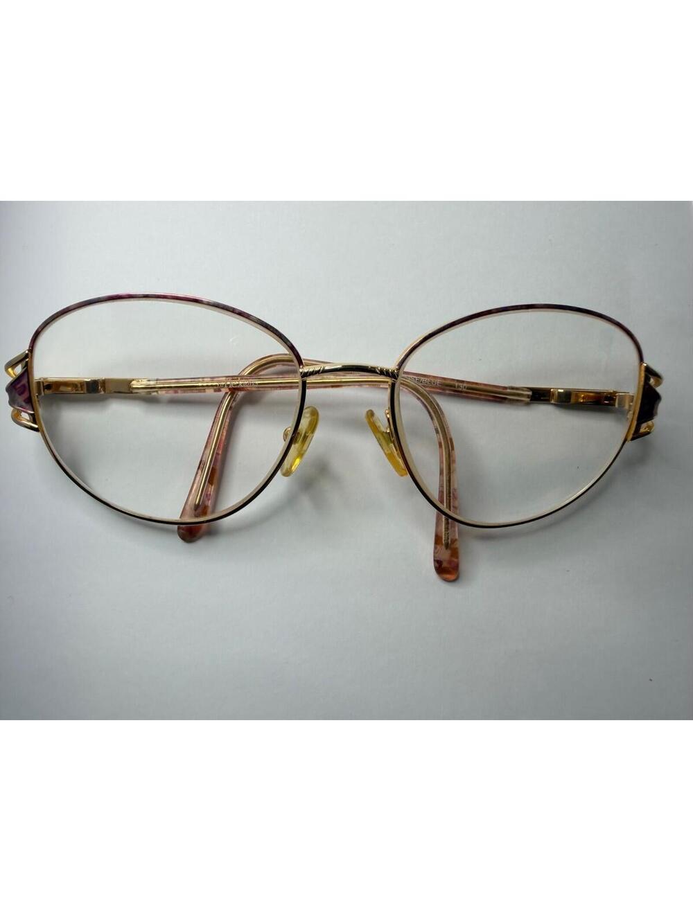 Vintage pair  Reflexions 302 eyeglass frames featuring rose & blue color scheme